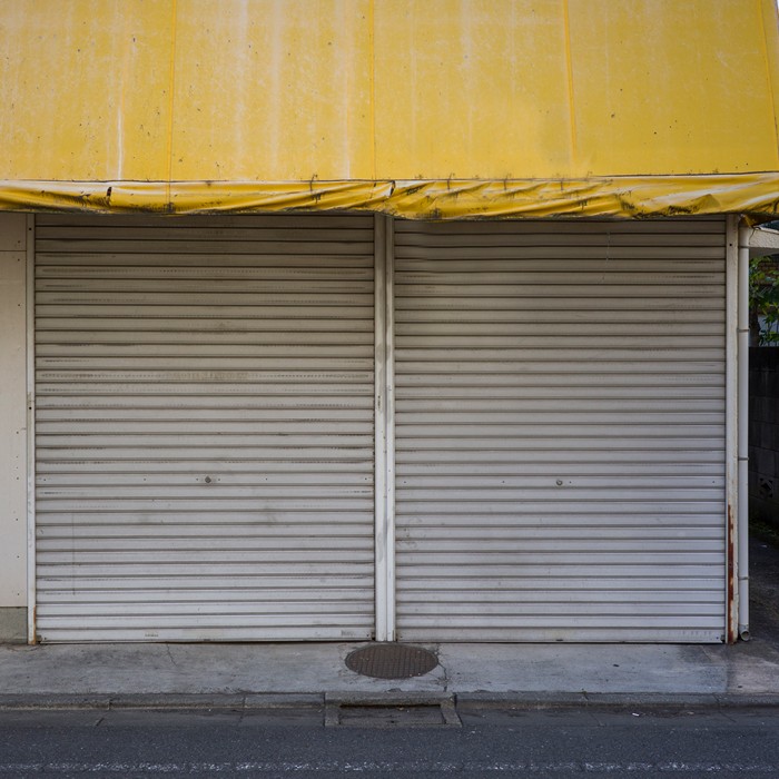 Safety sensors being tested during garage door installation